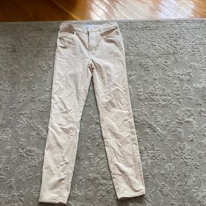 Beige corduroy pants.